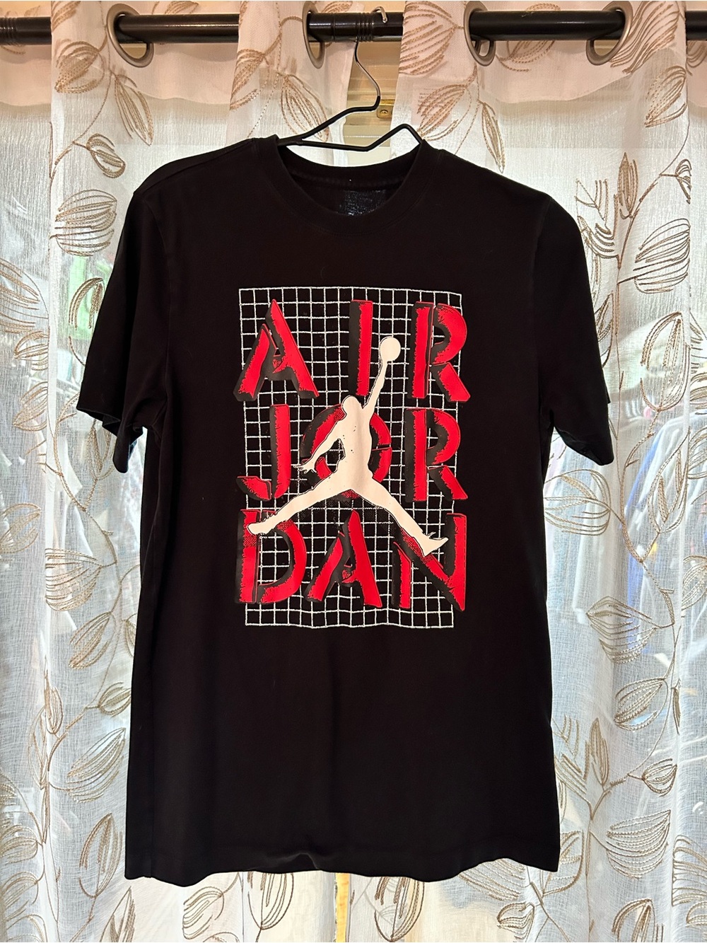 Jordan Black Short-Sleeve Graphic Tee with Red and White Logo